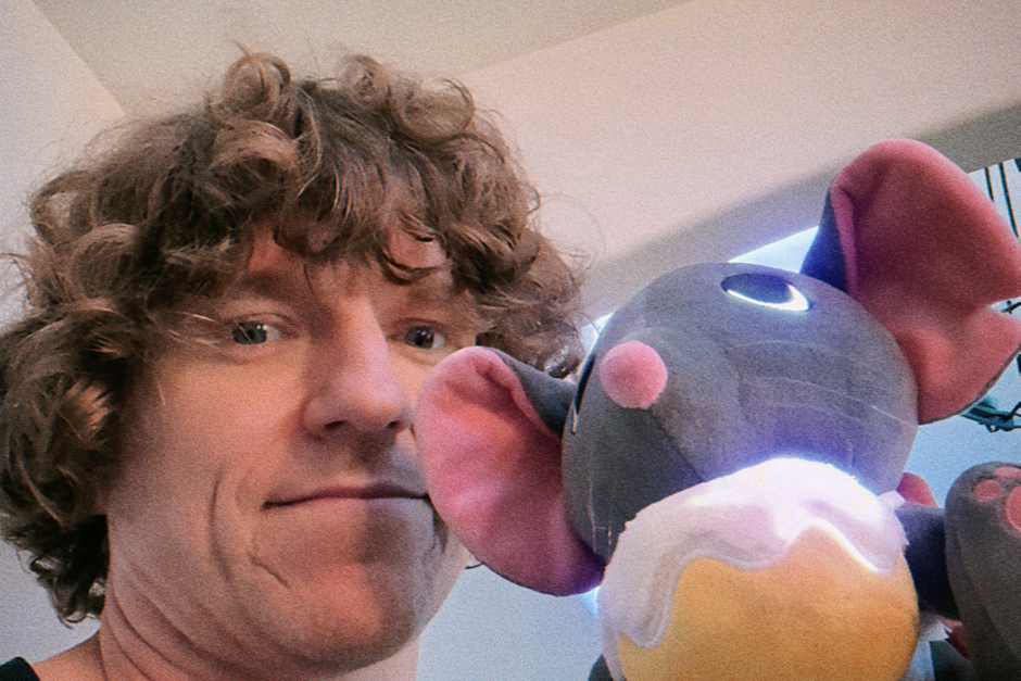 Travis Baldree with Thimble Plushie from Legends & Lattes