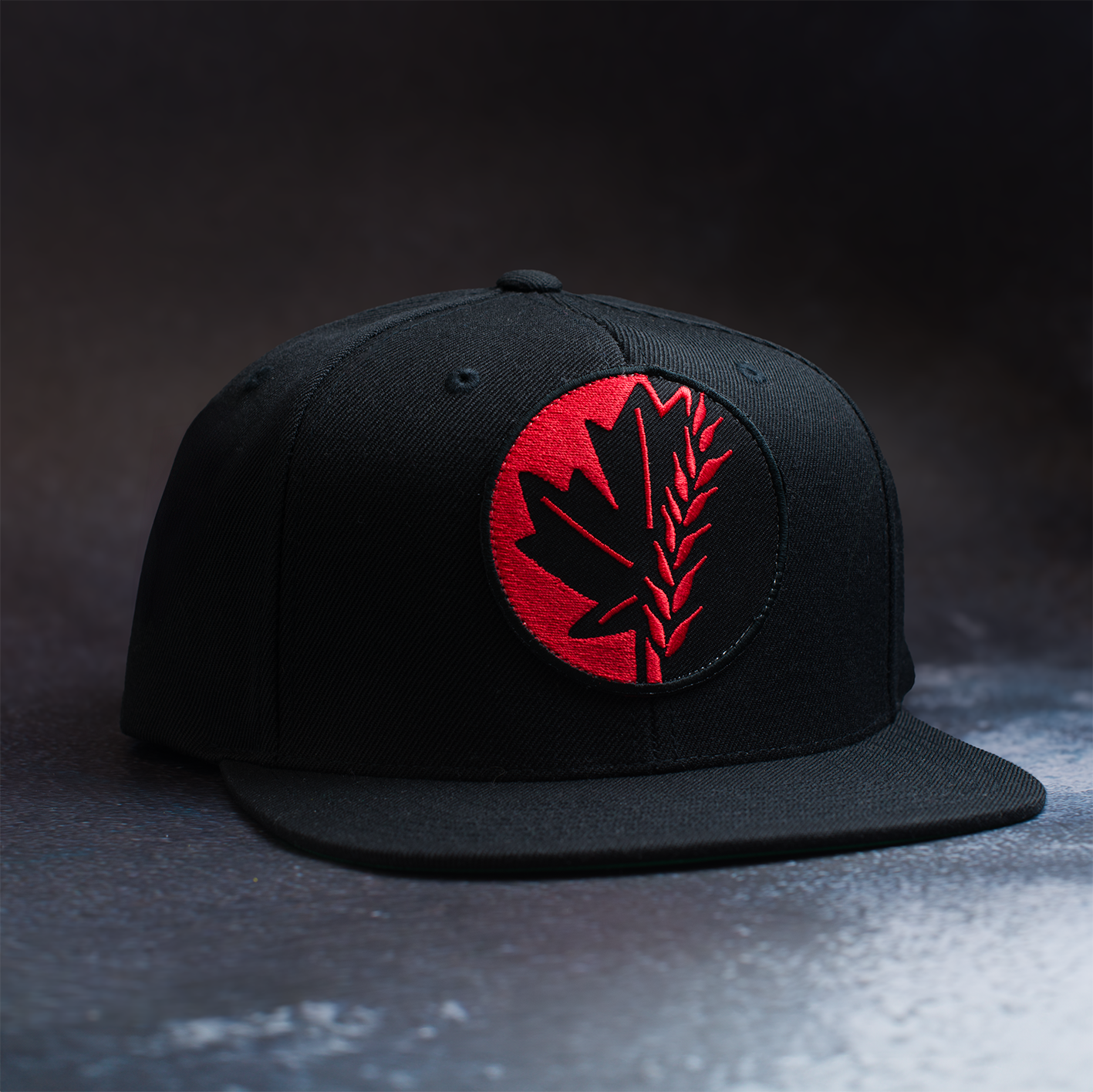 Black snapback hat with 3" embroidered patch featuring the Fa Ram logo.