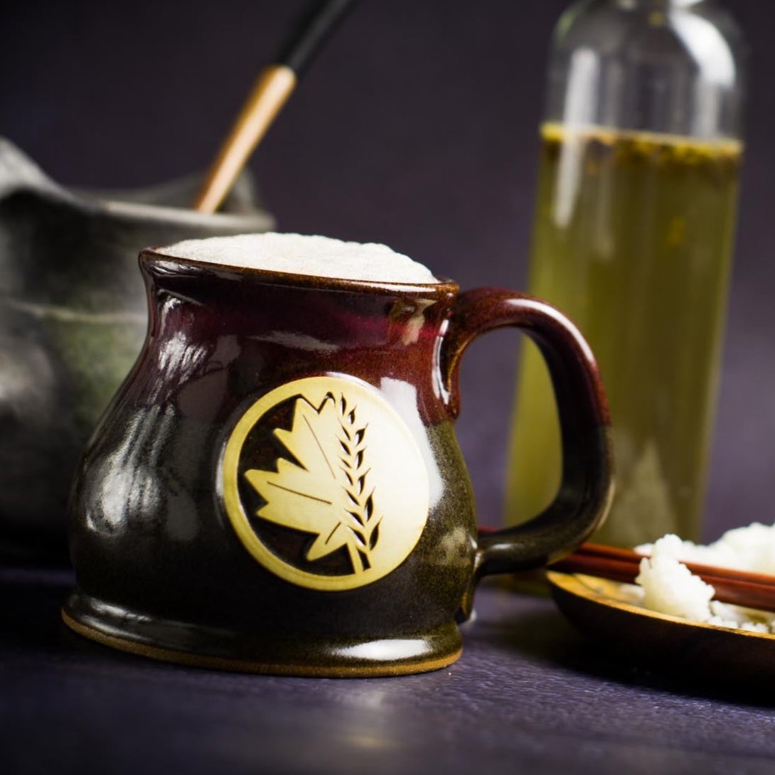 Fantasy homewares from The Merch Guild — mugs, drinkware, kitchenware, and décor inspired by cozy fantasy and LitRPG stories.