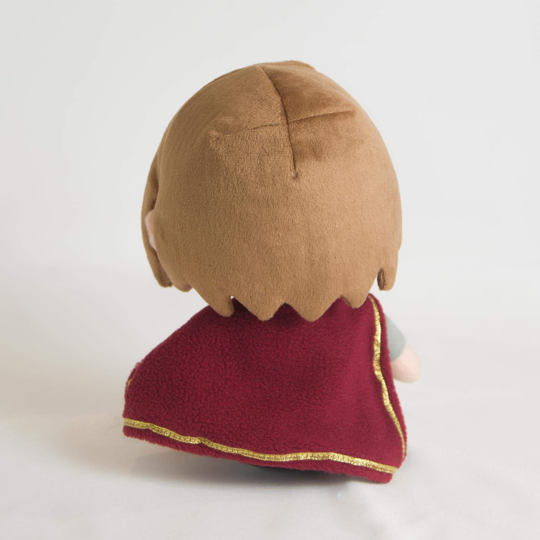 Elaine Collectible Plush, back view showing cape and gold trim