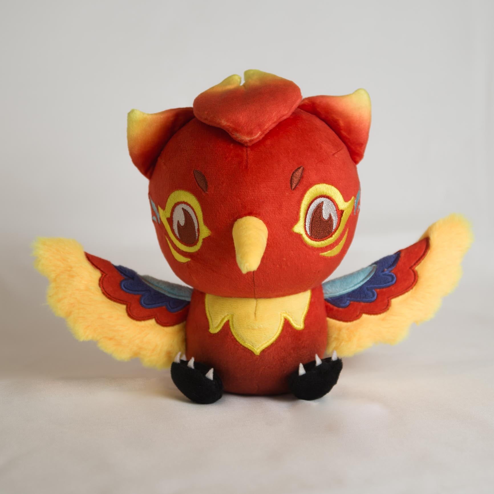 Auri Collectible Plush, front view with wings spread, alternate