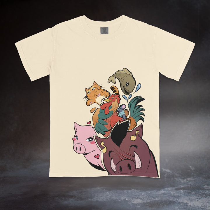 Mockup: ivory Comfort Colors tee with the Disciples print of a boar, pig, rooster, cat and fish running down to the hem, on a dark studio backdrop. Beware of Chicken merch by Casualfarmer