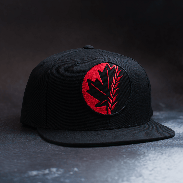 Black snapback hat with embroidered Fa Ram logo patch on the front. 3/4 view.