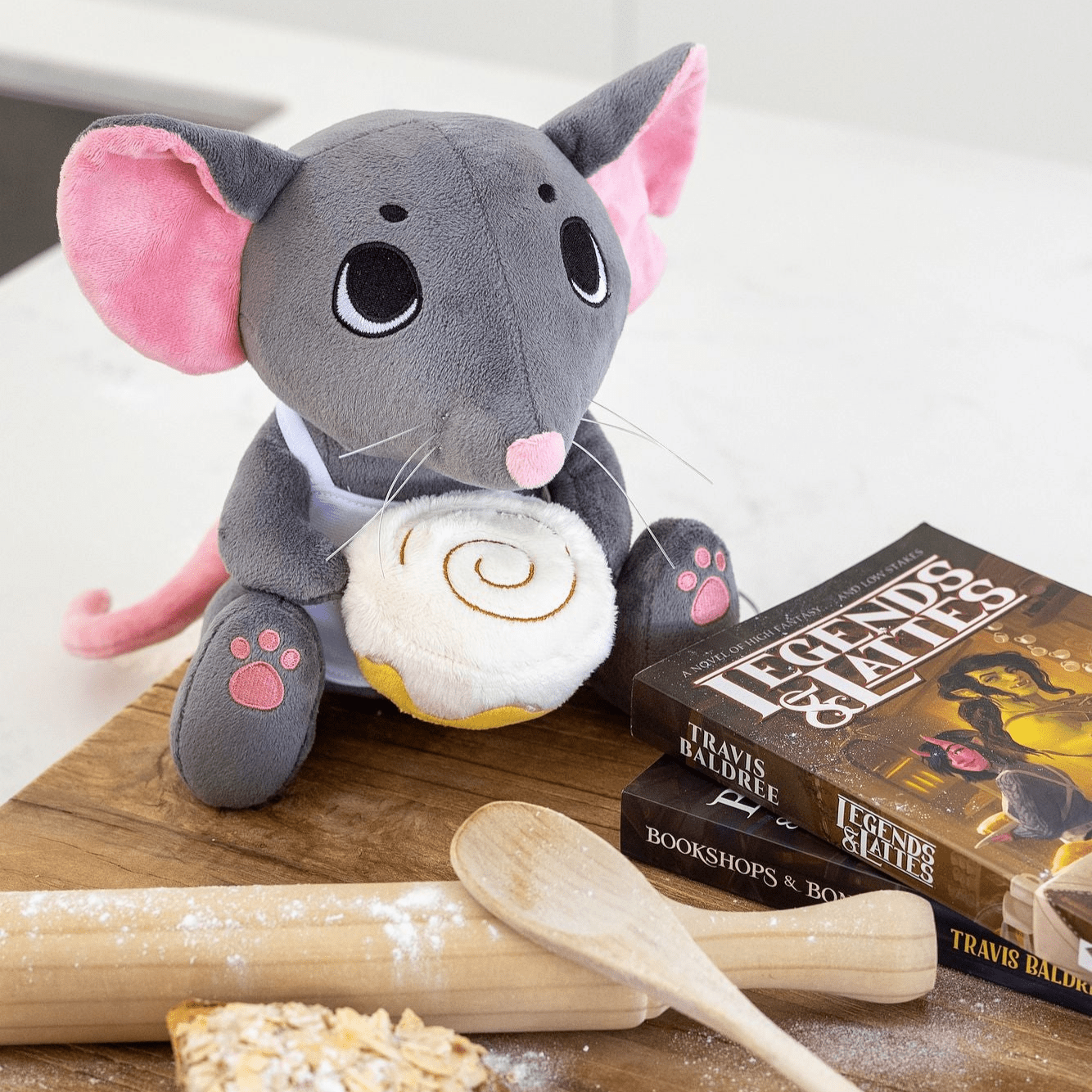 Thimble Plushie from Legends & Lattes. Official cozy fantasy bookish merch from Travis Baldree’s bestselling novel.